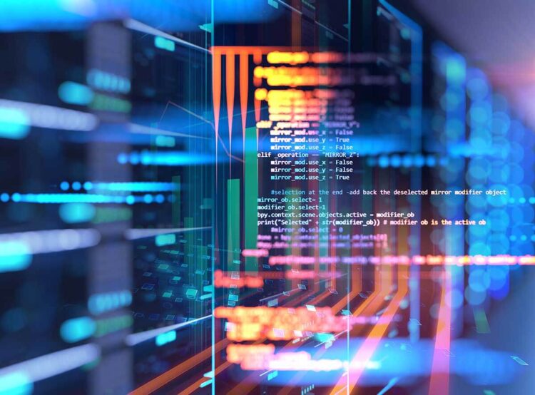 Colorful lines of computer code overlay a blurred server room background, symbolizing programming, cybersecurity, and digital data processing.
